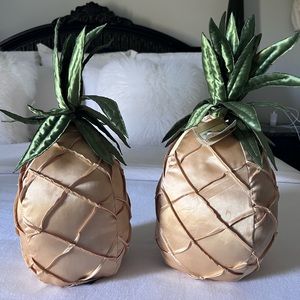 Two decorative pineapple throw pillows